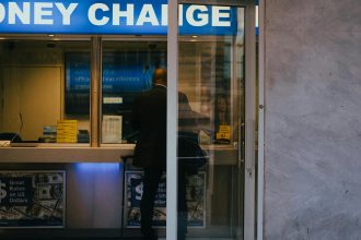 The Office of the Comptroller of the Currency's seal hangs on a brick building. ... Currency on Tuesday for a national bank trust charter, according to ...