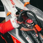 Mahindra Formula E car racing on track during pre-season testing. ... These sessions will allow the public to watch mechanics and engineers at work as ...