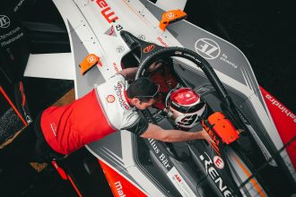 Mahindra Formula E car racing on track during pre-season testing. ... These sessions will allow the public to watch mechanics and engineers at work as ...
