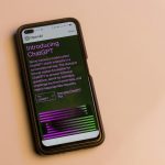 Thermo Fisher Scientific To Accelerate Life Science Breakthroughs With OpenAI | Hand interacting with a digital interface displaying AI icons, data charts and neural network graphics. Credit: iStock. ... Thermo Fisher Scientific Inc ...