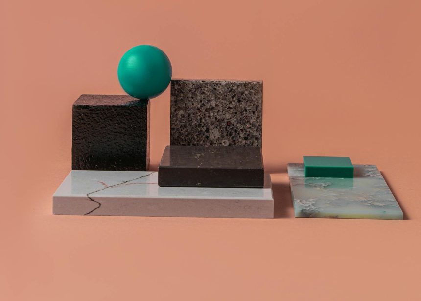 Causality-Aware 2D Materials Benchmark for Economics & Policy