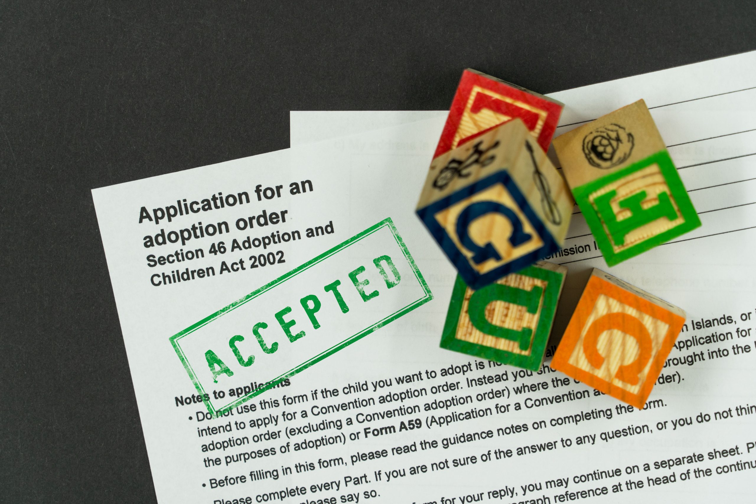 Accepted_Adoption_Application_with_children27s_letter_blocks_near_by
