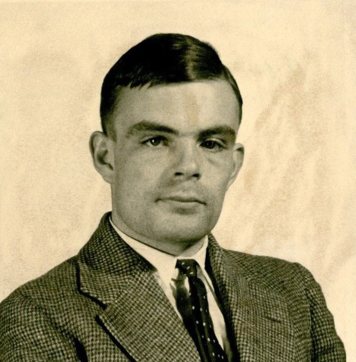 The Turing Test prioritizes behavioral output, potentially masking the total absence of internal experience. Alan_Turing_281912-195429_in_1936_at_Princeton_University