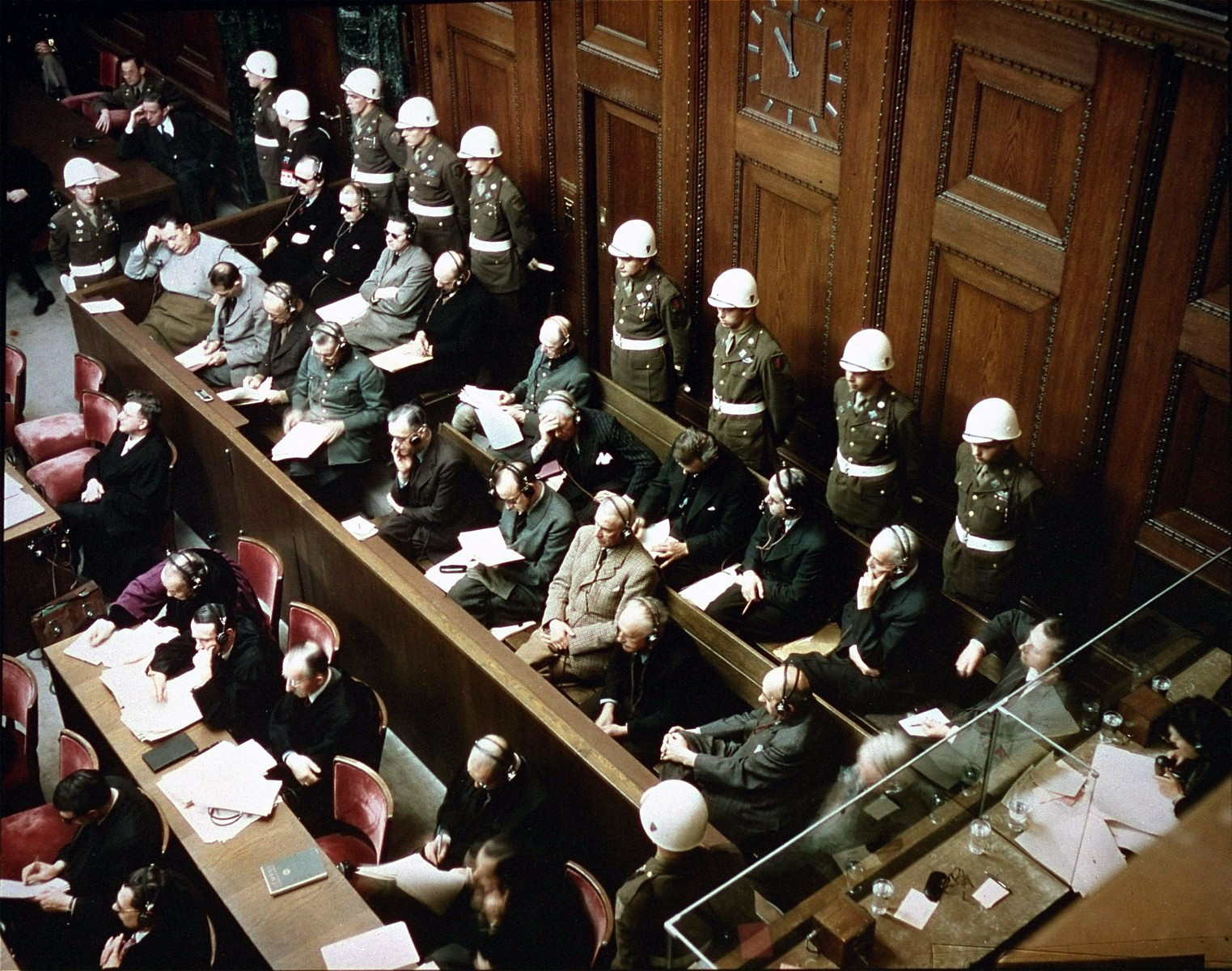 Defendants possess a legal right to understand the factors influencing algorithmic risk assessment scores. Defendants_in_the_dock_at_nuremberg_trials