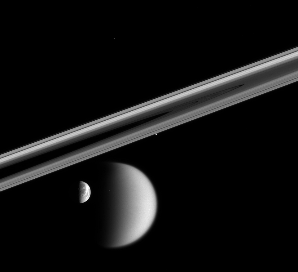 The Saturnian Anchor: Why Mercurial Speed Is Nothing Without Structural Density Four_Saturnian_moons_PIA07644