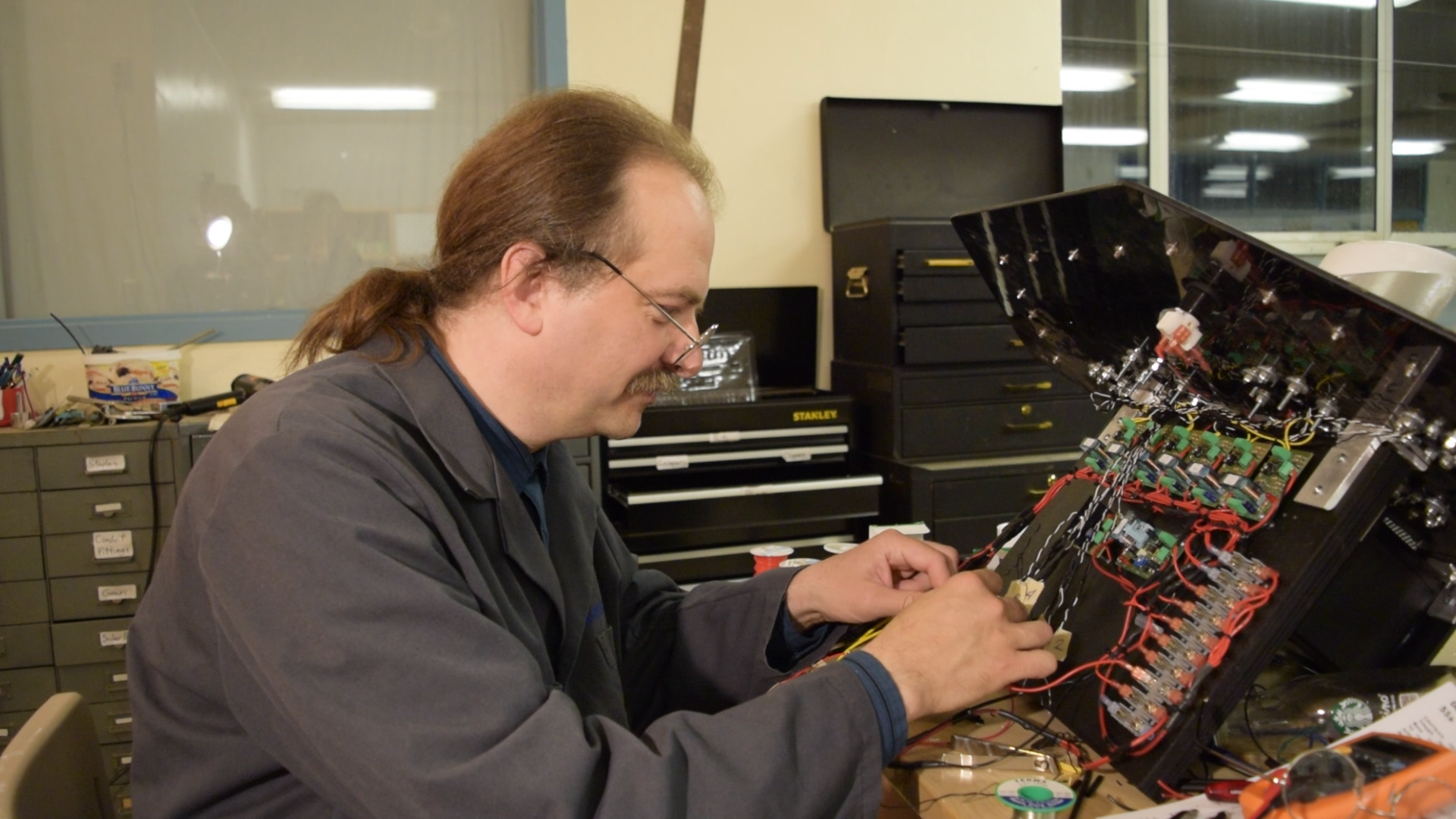 John_Siegel_designing_circuitry_for_interactive_scientific_art_prototype