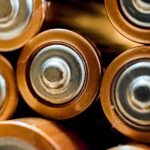 Accelerating Solid-State Battery Discovery via Few-Shot Learning Detailed view of grouped cylindrical batteries showcasing industrial energy concepts.
