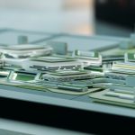 Architecting Edge-Native AI Tutors for Private Learning Close-up view of a futuristic architectural model showcasing urban design elements.