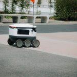 Autonomous Zero-Knowledge Proofs: Guide to Complex Systems A modern autonomous delivery robot navigating an urban environment. Innovative technology for food delivery.