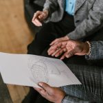 Business professionals discussing virtual reality design ideas during a meeting.