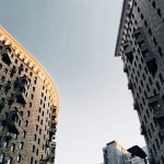 <h1>Beyond Correlation: Building a Causality-Aware Quantum ML Benchmark for Economics and Policy</h1> Low angle view of modern skyscrapers in Moscow with a clear evening sky.