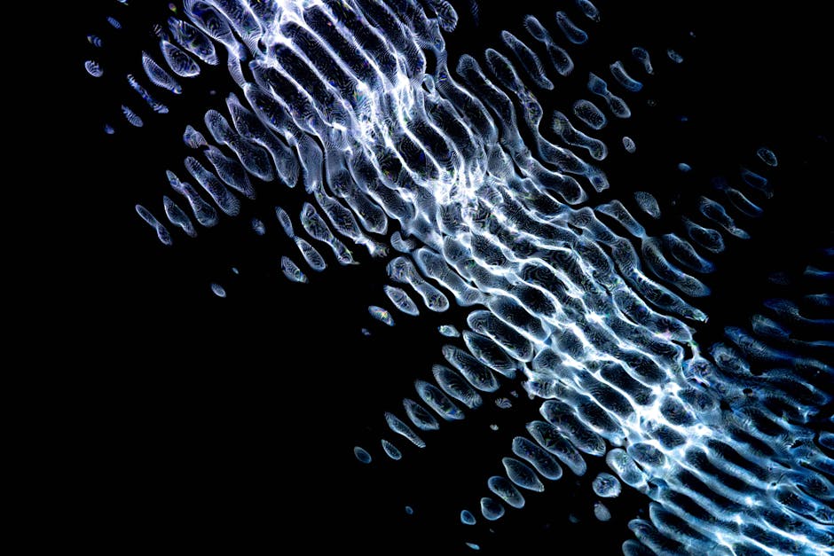 Dynamic abstract digital artwork featuring glowing geometric ripples on a dark background.
