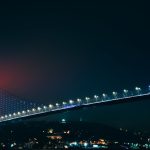 <h1>Bridging the Divide: Bio-Inspired Neurosymbolic Reasoning for the Future of AI</h1> Striking night view of Bosphorus Bridge with vivid lights illuminating Istanbul skyline.