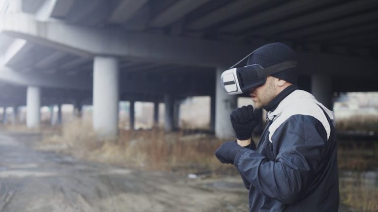 Man wearing VR headset under a bridge, exploring virtual reality outdoors.