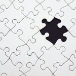 <h1>Bridging the Intelligence Gap: Cooperative Neurosymbolic Reasoning in Edge and IoT Environments</h1> Close-up of an incomplete white puzzle with one missing piece, symbolizing challenge and strategy.