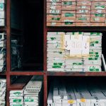 <h1>Building an Edge-Native Supply Chain Resilience Platform for Bioelectronics</h1> Image of a warehouse showcasing organized stacks of building materials on shelves.