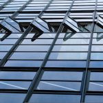 Close-up of open windows on modern Bauhaus building facade in Dessau, Germany.