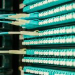 <h1>Causality-Aware Topological Computing: The Future of Quantum Resilience</h1> Networking cables plugged into a patch panel, showcasing data center connectivity.
