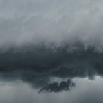 A striking capture of dramatic storm clouds gathering, showcasing nature's fury.