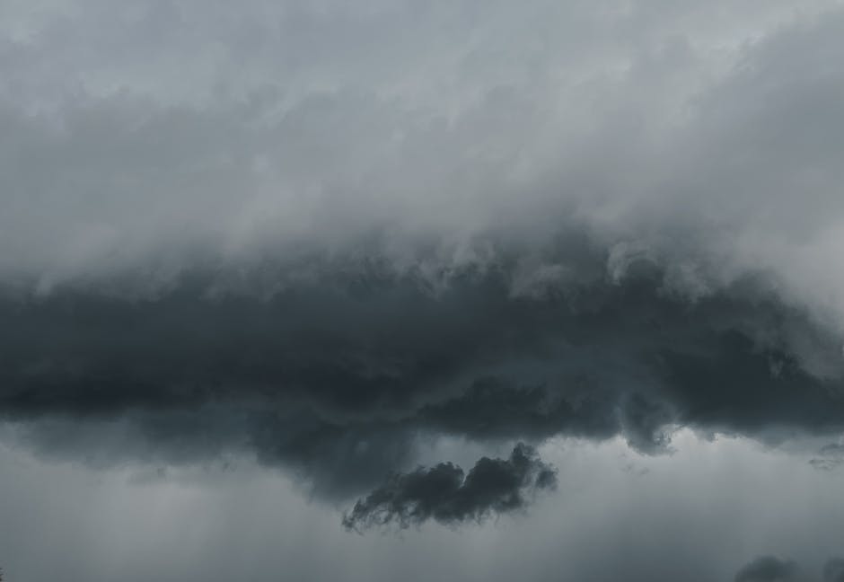 A striking capture of dramatic storm clouds gathering, showcasing nature's fury.