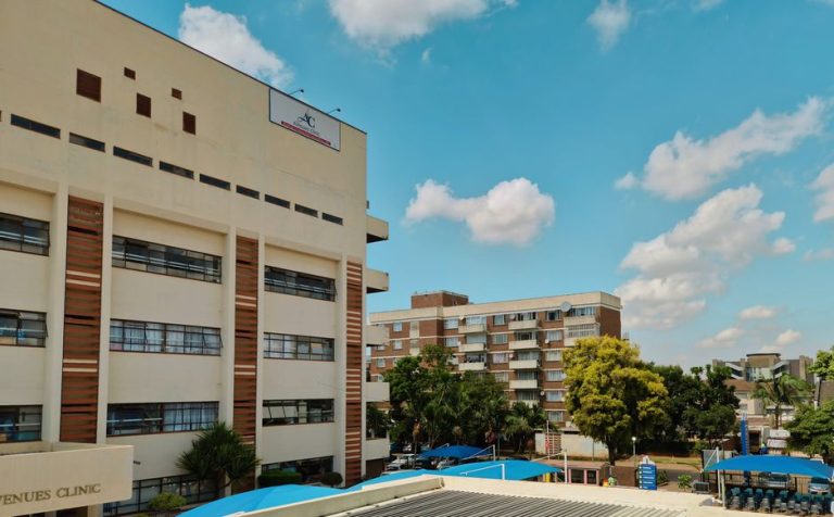 Avenues Clinic with blue sky and urban setting in Harare, Zimbabwe.