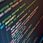 Compiler-Level Cybersecurity for Soft Robotics Vivid close-up of code on a computer screen showcasing programming details.