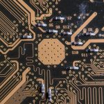Detailed image of a printed circuit board highlighting electronic pathways and components.
