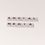 Creative Strategy: How Media Literacy Drives Better Decision Making Scrabble tiles spelling 'social media' on a white background, representing digital communication concepts.