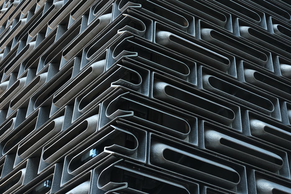 Intricate modern architectural facade with geometric metal patterns capturing urban design.