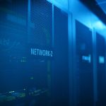 A modern server room featuring network equipment with blue illumination. Ideal for technology themes.