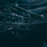 Few-Shot Semantic Web Protocols for Supply Chains Intricate close-up of dewy spider webs against a dark background, evoking a mystical and moody atmosphere.