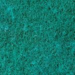 Close-up view of an emerald green textured surface, ideal for background use.