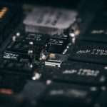 Interpretable Neuromorphic Chips for Synthetic Media Detailed macro shot of electronic circuit components showcasing intricate design and layout.