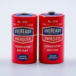 Close-up of two vintage Eveready Energizer transistor batteries on a white background.