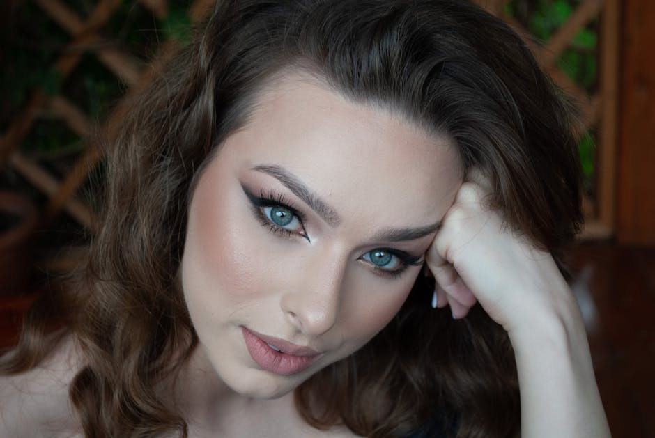 Close-up portrait of a woman with captivating makeup and vibrant eyes. Perfect for beauty and lifestyle content.