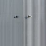 Privacy as a Competitive Advantage: The New Strategic Imperative Corrugated metal wall with two mounted security cameras in a minimalist style.