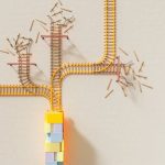 Creative illustration of train tracks on wooden blocks, depicting decision making concepts.