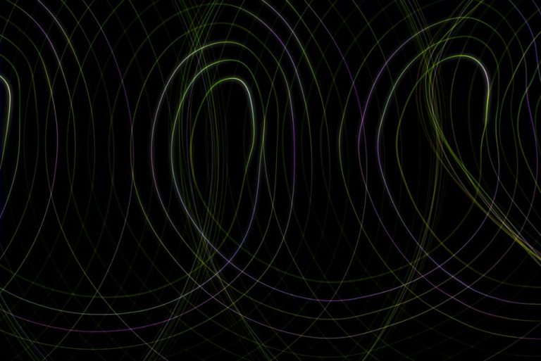 Captivating abstract design with loops and lines on a dark backdrop, ideal for modern projects.