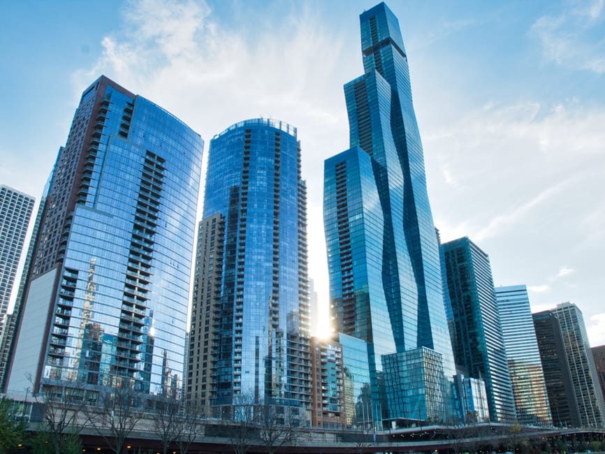 Discover the iconic skyscrapers of downtown Chicago with reflective modern architecture.