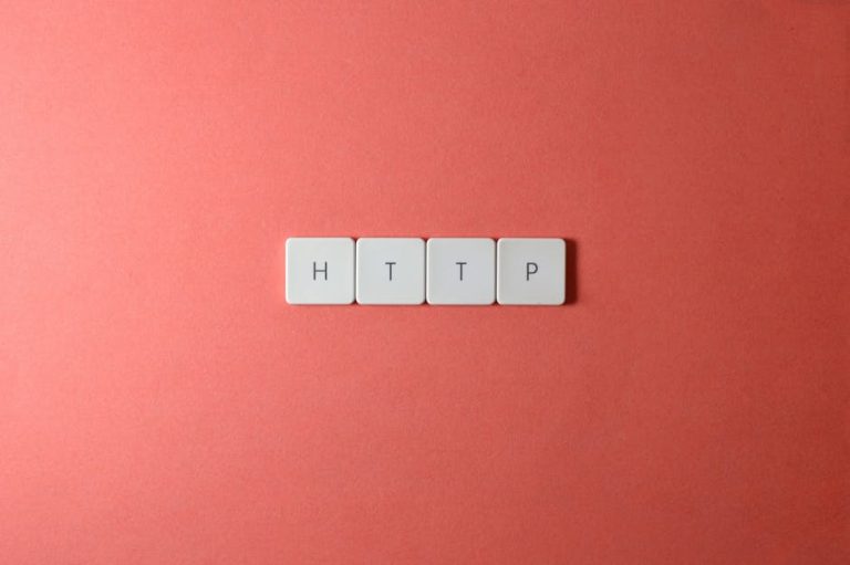 HTTP spelled with keyboard keys on a pink background, minimalist style.