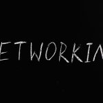 <h1>Symbol-Grounded Intent-Centric Networking Compilers: The Future of Cyber Resilience</h1> Handwritten 'Networking' text on a chalkboard styled black background, symbolizing communication.