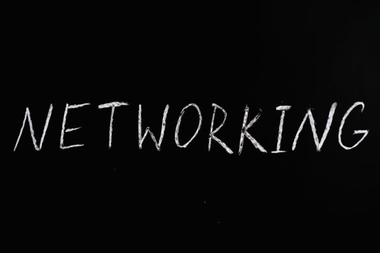 Handwritten 'Networking' text on a chalkboard styled black background, symbolizing communication.