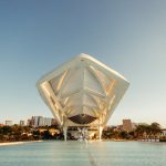 Explore the futuristic design of the Museum of Tomorrow in Rio de Janeiro, set against a tranquil urban backdrop.
