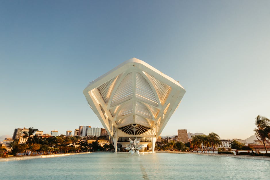 Explore the futuristic design of the Museum of Tomorrow in Rio de Janeiro, set against a tranquil urban backdrop.