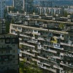 The Brutal Economics of Space: Historical Lessons in Execution Aerial view of residential buildings in Kyiv showcasing Soviet-era architecture.