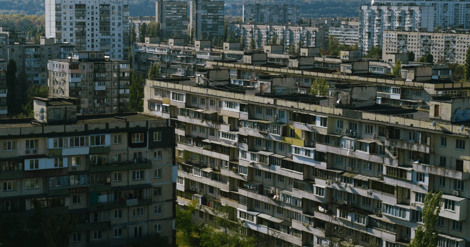 Aerial view of residential buildings in Kyiv showcasing Soviet-era architecture.