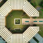 Stunning aerial drone shot of a hexagonal building in Yamoussoukro, Côte d'Ivoire.