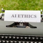 The Ethical Edge: Why High-Performance Leaders Need Spiritual Practice A vintage typewriter outdoors displaying "AI ethics" on paper, symbolizing tradition meets technology.