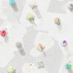 The Ethics of Space Exploration: A Strategic Framework for Leaders A vibrant 3D render of geometric shapes scattered over a circuit-like background.