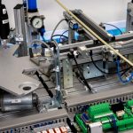 The Evolution of Automation: From Mechanical Logic to Systemic Power Close-up of advanced machinery showcasing robotic automation and precision engineering.